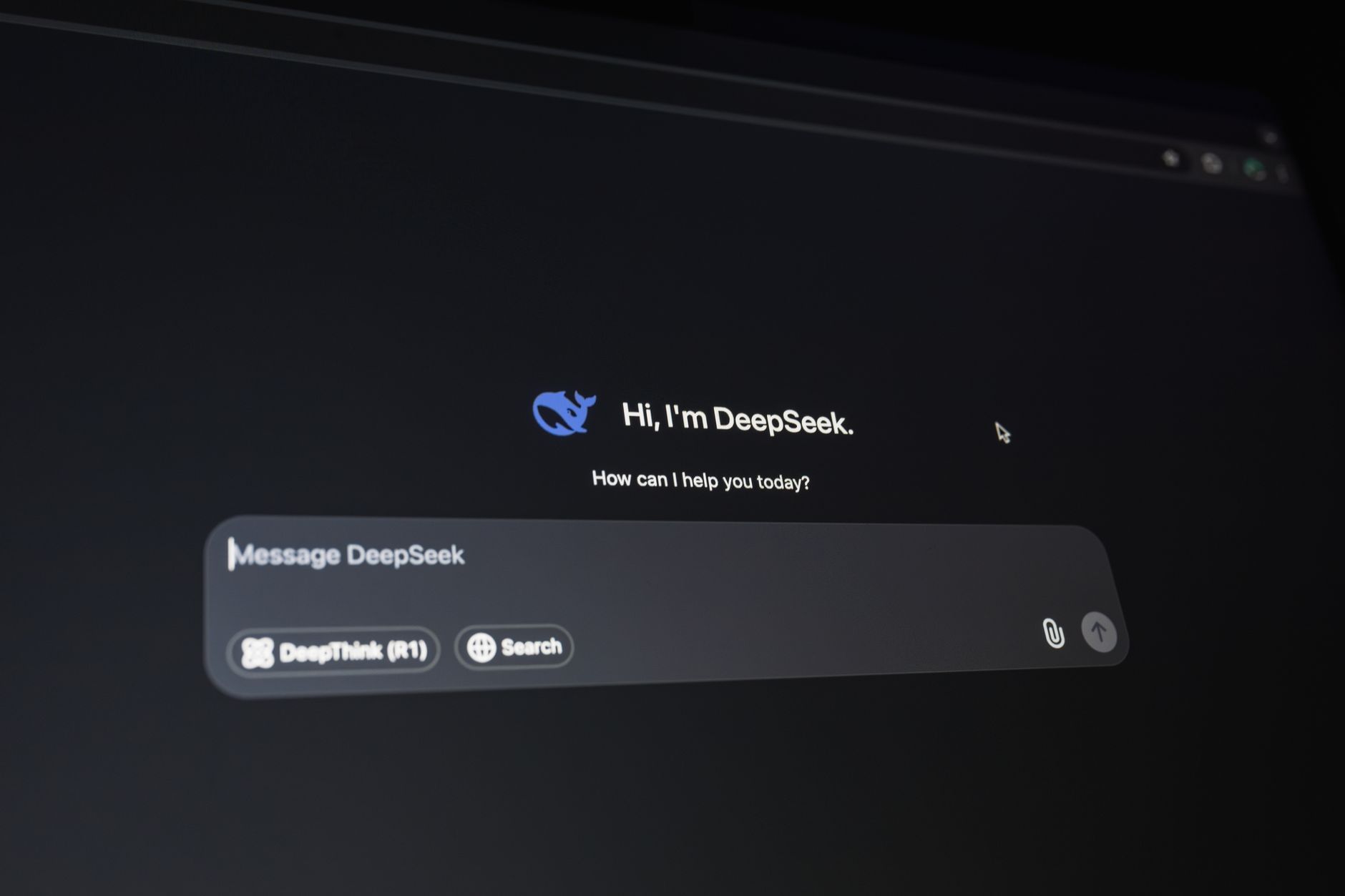 A person holds a phone displaying an AI search answer with linked sources on screen.